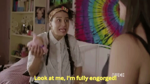GIF of Ilana Glazer saying "Look! I'm fully engorged!"