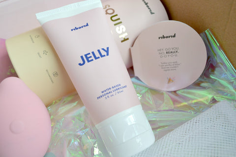 Pink bottle of lubricant named Jelly