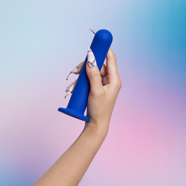 Pogo dildo held in a hand