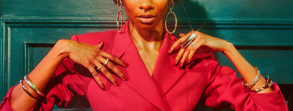 cropped image of woman in suit with palma ring on