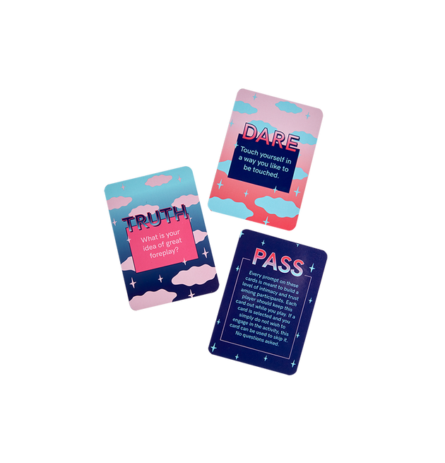 Flat-lay of Truth or Dare Cards. Truth example: What is your idea of great foreplay? Dare example: Touch yourself in a way you like to be touched. A pass card is also included to pass on any card you do not wish to engage in.