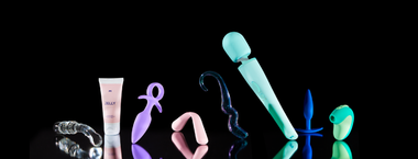 photo of Gem glass dildo, Jelly lubricant, Shimmy anal plug, Bender vibrator, Stellar glass dildo, stimulating Jolt Gel, Ollie Vibrator, Nudge anal plug and Puff vibrator against a black background